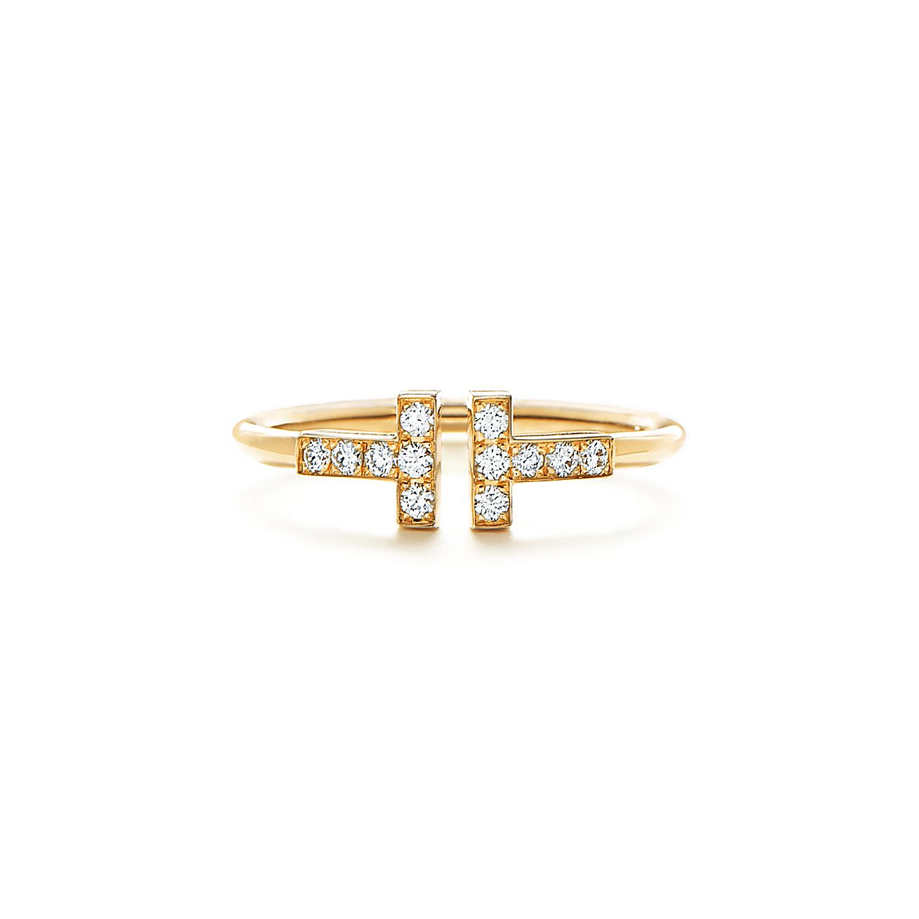 Anillo T Dorado y Zirconias