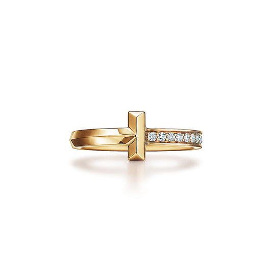 Anillo T Dorado y Zirconias