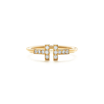 Anillo T Dorado y Zirconias