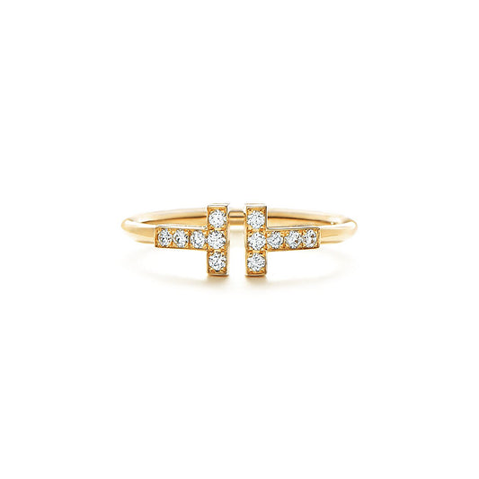 Anillo T Dorado y Zirconias